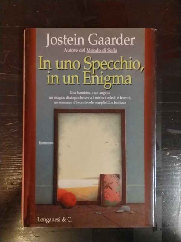 In un specchio, in un enigma
