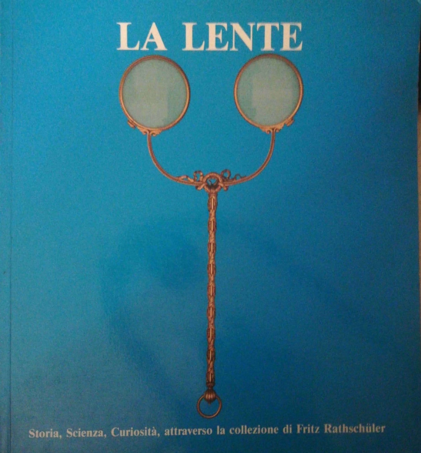 La lente. Storia, Scienza, Curiosità attraverso la collezione di Fritz Rathschuler. Catalogo mostra Genova 1988 - copertina